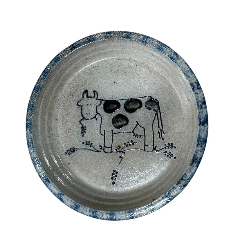 Ceramic plate with a cow illustration