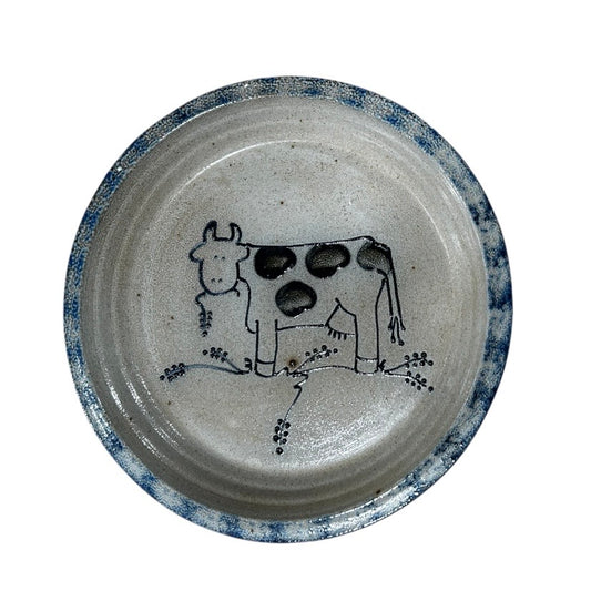 Ceramic plate with a cow illustration